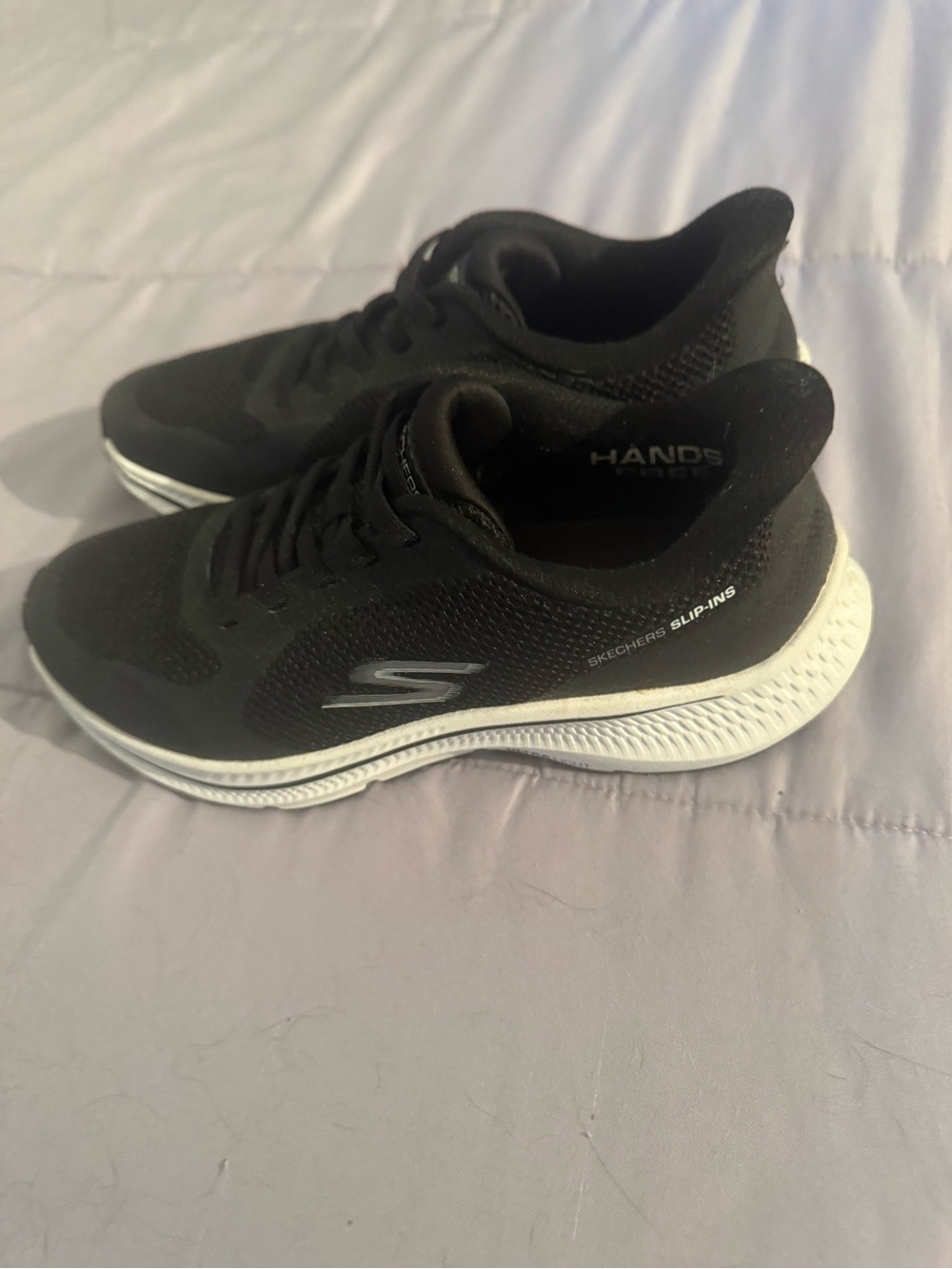 Skechers Black and White Slip-On Style Athletic Sneakers